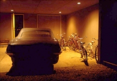 William Eggleston, Untitled, (Car and Bicycles in Garage) Memphis, TN, 1970, dye-transfer print, 16 &times; 20 in.