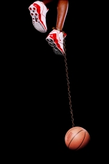 Hank Willis Thomas,&nbsp;Basketball and Chain,&nbsp;2003, digital C-print, 96 x 50 inches